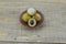 Fresh longan in plate on wooden background