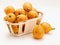 Fresh loquats medlars in wicker basket.