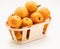 Fresh loquats medlars in wicker basket.