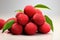 Fresh lychee fruit on a white background