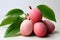 Fresh lychee fruit on a white background