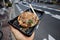 Fresh made japanese okonomiyaki as street food in Osaka