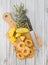 Fresh made Pineapple rings dried on a rustic background