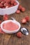 Fresh made Strawberry powder on a rustic background