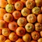 Fresh mandarin oranges, texture macro image, abundance of citrus