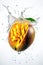 Fresh mango in motion suspended with splash of water over white background.