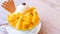 Fresh mango shaved ice with a scoop of ice cream and juice sauce in summer restaurant, lifestyle, popular food in Taiwan, close up