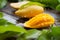 Fresh Mango tropical fruit slice with splashing water