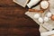 Fresh milk, eggs and flour over wooden background