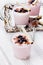 Fresh milkshake, yogurt, dessert, smoothie with strawberry decorated grated chocolate and frozen blueberries