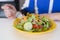 Fresh mixed tuna and vegetable salad in yellow plate