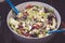 Fresh mixed vegetables salad in a bowl. Selective dark focus