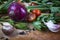 Fresh mixed vegetables on wooden board, concept of healthy eating and diet