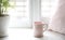 Fresh morning tea.Mug on window sill.Love word, valentine`s design background.Good mood concept