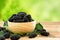 Fresh mulberries on wooden table.