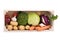 Fresh multi-colored vegetables in wooden crate. Organic food. White background