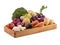 Fresh multi-colored vegetables in wooden crate. Organic food. White background