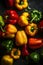 Fresh multicolored bell peppers with water droplets. On the table in close-up.