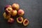 Fresh nectarines on a table.