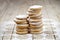 Fresh oat cookies stacks with sugar powder closeup on rustic wooden table