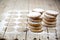 Fresh oat cookies stacks with sugar powder on rustic wooden table background