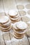 Fresh oat cookies stacks with sugar powder on rustic wooden table background