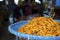 Fresh orange chili pepper at a street market