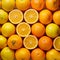 Fresh orange fruit background, top view, vibrant citrus display