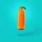 Fresh orange juice in a bottle on a blue background. Natural orange bottle with a leaf. Creative healthy product. Summer concept.