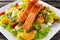 Fresh Orange Salmon salad with honey, tomatoes, onion, mandarin. healthy food concept.