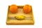 Fresh oranges and banana stack smiling shape in wooden box on