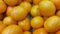 Fresh oranges in supermarket for sale, pile of orange in market for texture