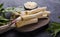 Fresh orgaanic horseradish or Horse-radish root on wooden cutting board.  top view