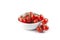Fresh organic cherry tomatoes bunch on ceramic bowl