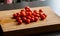 Fresh Organic Cherry Tomatoes on Wooden Board - Vibrant Farm-to-Table Delight