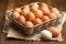 fresh organic eggs in a metal mesh basket