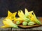 Fresh, organic flowers of zucchini on wooden table. rustic style.