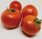 Fresh organic Four Red tomatos in white background