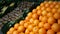 Fresh organic fruits oranges, kiwi, bananas on display in farmers market