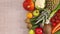 Fresh organic fruits and vegetables appear on right side. Stop motion