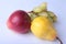 Fresh organic fruits on white background. Assorted apple, pear and grapes.