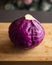 Fresh Organic Red Cabbage Close Up on Wooden Board - Vibrant and Nutrient-Rich Beauty