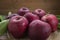 Fresh organic ripe apple fruits on old wooden table