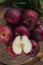 Fresh organic ripe apple fruits on old wooden table