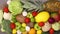 Fresh organic and ripe fruits and vegetables ordered on the kitchen table. Stop motion
