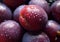 Fresh organic ripe plums with water drops.AI Generative