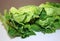 Fresh Organic Romaine Lettuce Leaves on cutting board