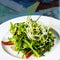 Fresh organic vegetable salad on whte plate.