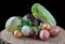 Fresh organic vegetables, cabbage, onions, potato, green onions, on a wooden background