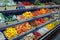 Fresh organic Vegetables and fruits on shelf in supermarket, farmers market. Healthy food concept. Vitamins and minerals.